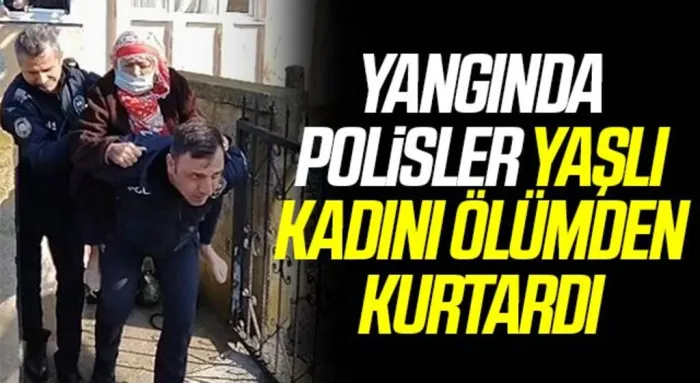 Yangında polisler yaşlı kadını ölümden kurtardı