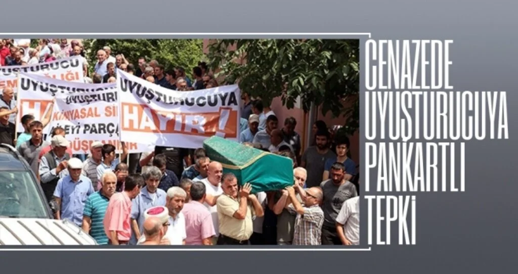 Cenazede uyuşturucuya pankartlı tepki