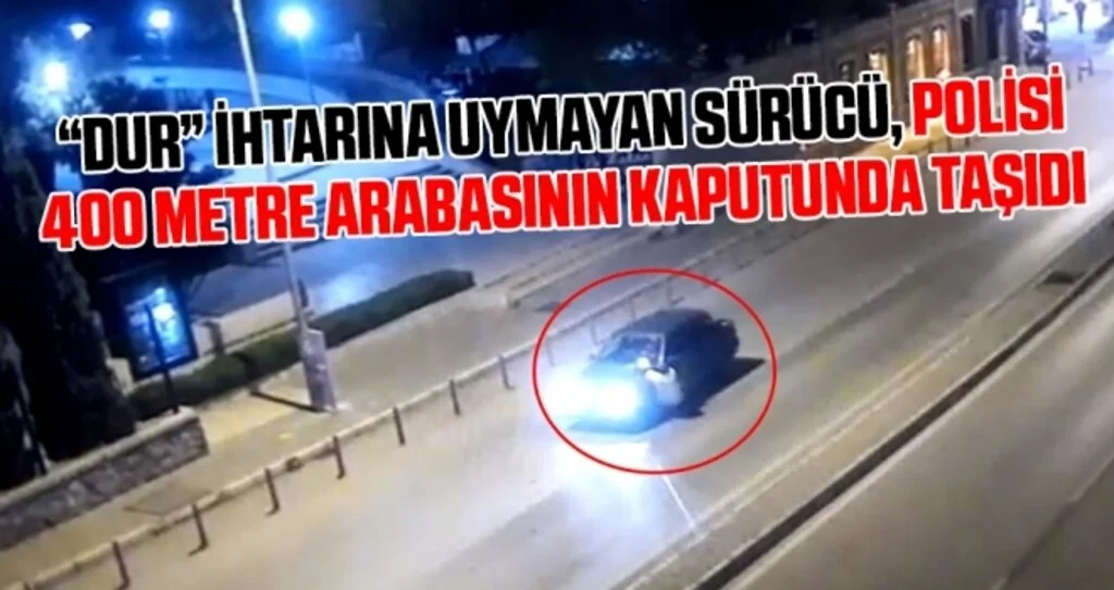 'Dur' ihtarına uymayan sürücü, polisi 400 metre arabasının kaputunda taşıdı