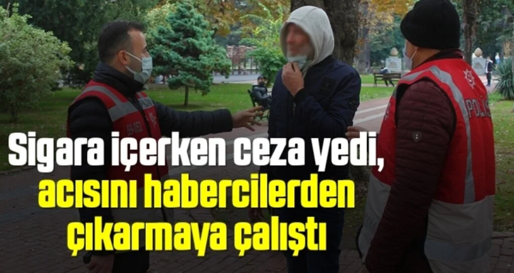 Sigara içerken ceza yedi, acısını habercilerden çıkarmaya çalıştı
