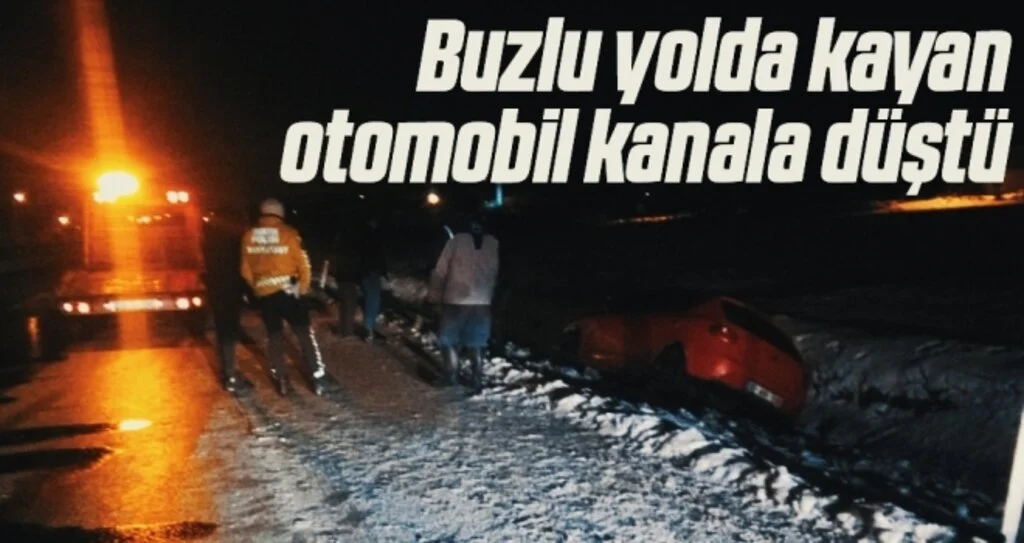 Buzlu yolda kayan otomobil kanala düştü