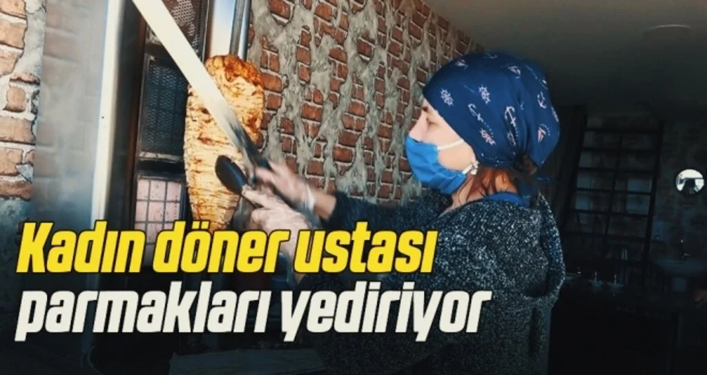 Kadın döner ustası parmakları yediriyor