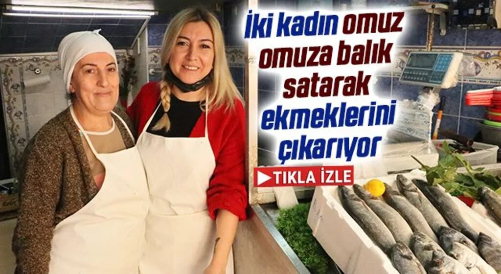İki kadın omuz omuza balık satarak ekmeklerini çıkarıyor