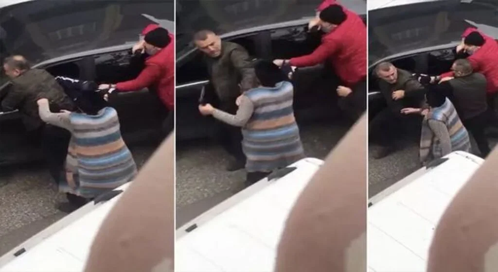 Oğlunu teslim etmek istemeyen anne, polisin belindeki silahı böyle aldı