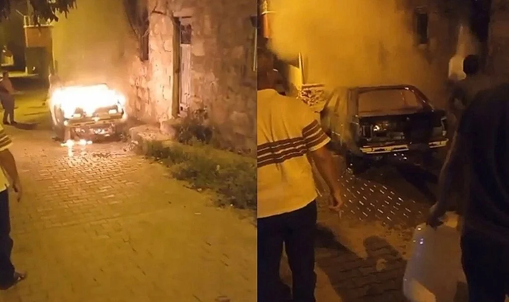 Alev topuna dönen aracı mahalle sakinleri söndürdü