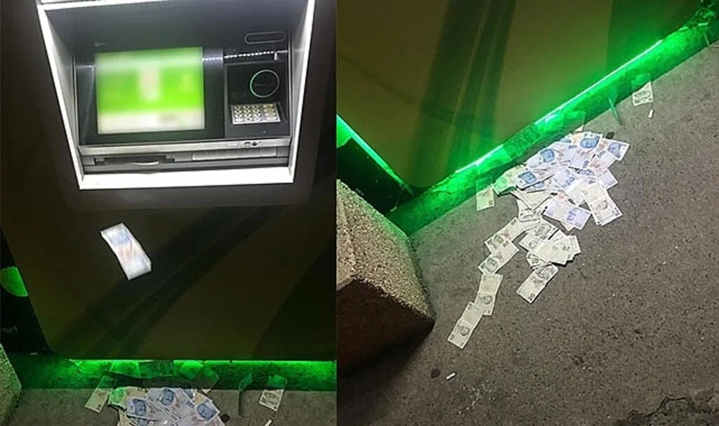 ATM'de şaşırtan görüntü! Yüklenen paralar yola saçıldı