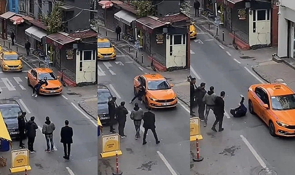 Beyoğlu'nda araçların önünü kesti, taksinin kaputunun üzerine yattı