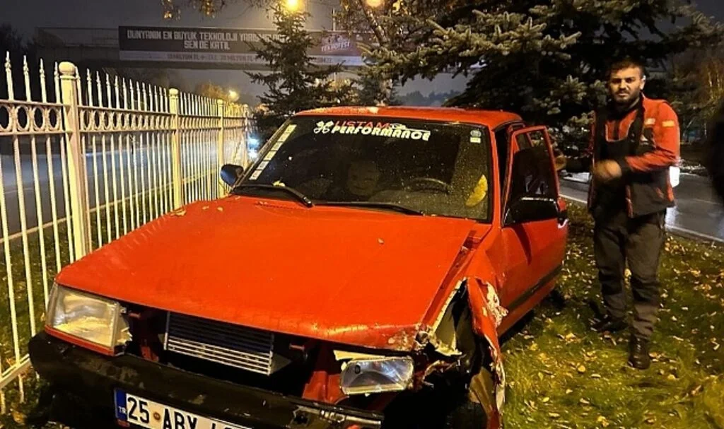 Islak zeminde kayarak refüje çıktı