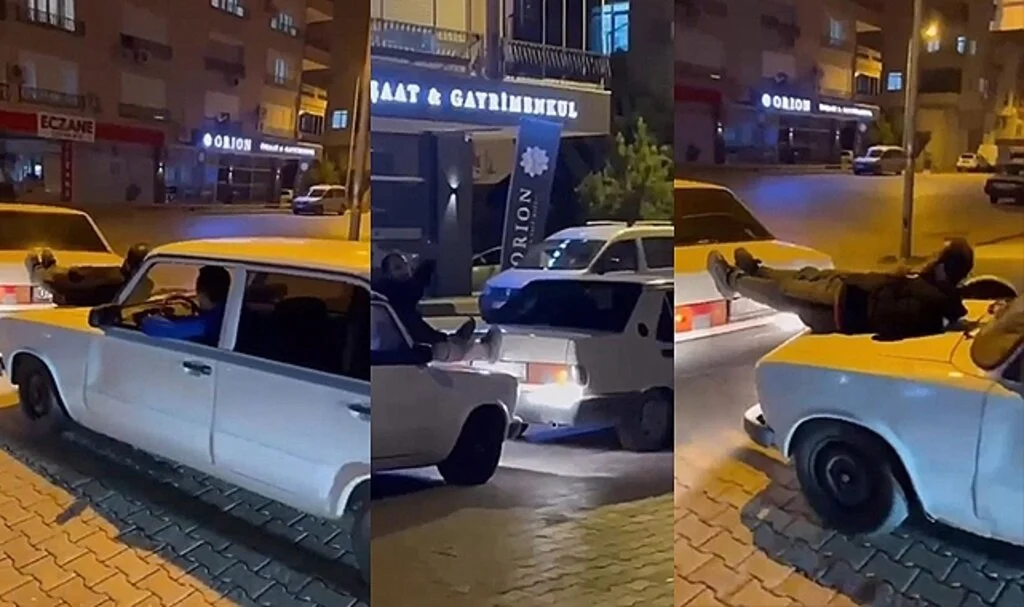 İki Otomobilin Arasına Uzanıp, Arızalanan Aracı Ayaklarıyla İtti