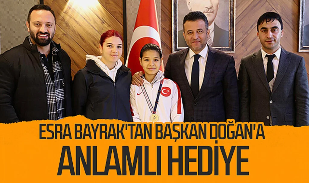 Milli sporcu Esra Bayrak'tan başkan Doğan'a anlamlı hediye 