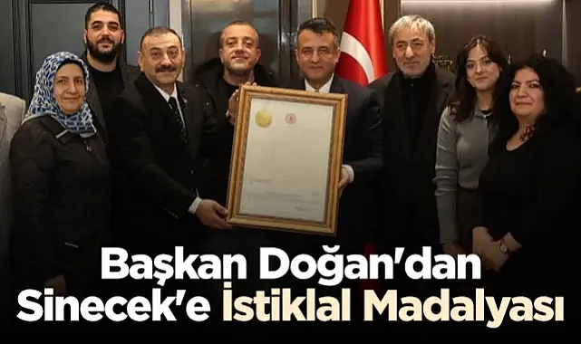 SBB Başkanı Halit Doğan'dan Metin Sinecek'e Anlamlı İstiklal Madalyası Hediyesi